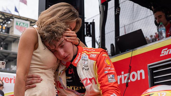 Team Penske driver David Malukas hugs his girlfriend, Kamila Jurkus after the 110th running of the Indianapolis 500.