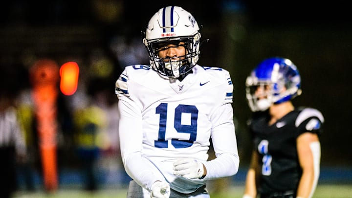 Farmington's Myles Smith celebrates a defensive stop during the Division 2 football district semifinal on Friday, Nov. 1, 2024.