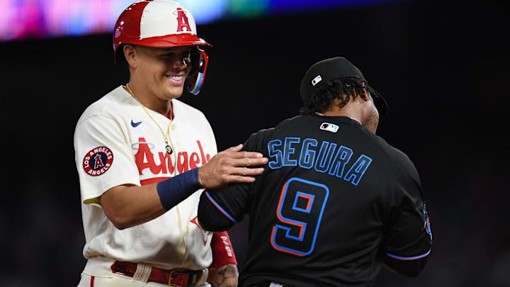 May 26, 2023; Anaheim, California, USA; Los Angeles Angels third baseman Gio Urshela (10) reacts after Miami Marlins third baseman Jean Segura (9) forces him out at third base during the sixth inning at Angel Stadium. Mandatory Credit: Jonathan Hui-Imagn Images