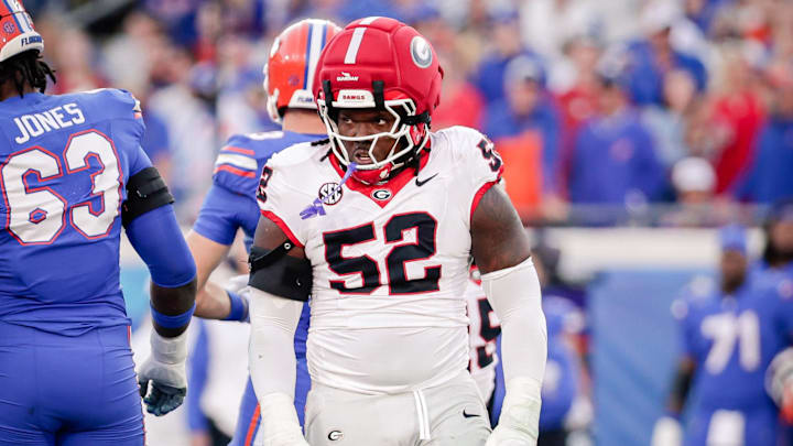 Nov 1, 2025; Jacksonville, Florida, USA; Georgia Bulldogs defensive lineman Christen Miller (52) reacts after making a tackle against the Florida Gators at EverBank Stadium.