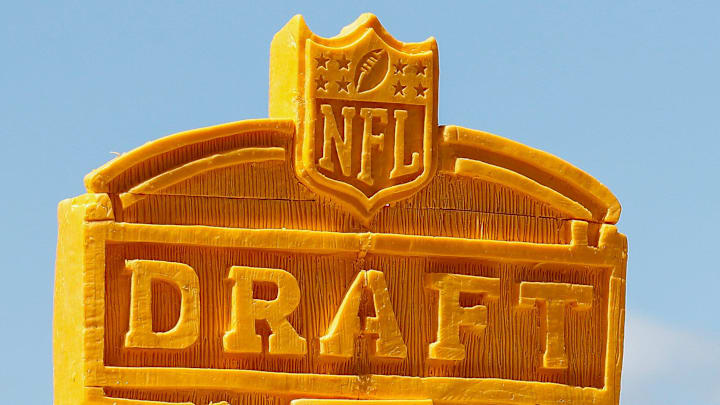 The 2025 NFL Draft logo is seen carved into blocks of cheese during the third and final day of the 2025 NFL Draft on Saturday, April 26, 2025, at Lambeau Field in Green Bay, Wisconsin. The 2025 NFL Draft logo is seen carved into blocks of cheese during the third and final day of the 2025 NFL Draft on Saturday, April 26, 2025, at Lambeau Field in Green Bay, Wisconsin.