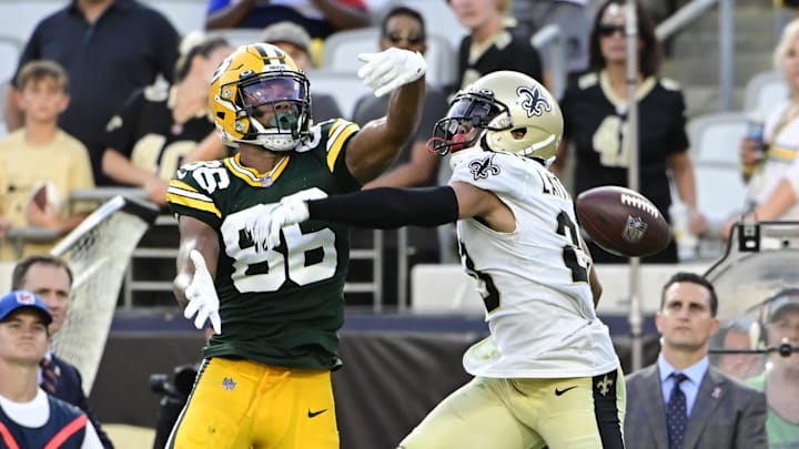 New Orleans Saints cornerback Marshon Lattimore (23) breaks up a pass intended for Malik Taylor in 2021.