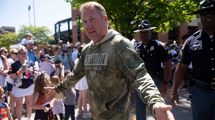Auburn Tigers head coach Hugh Freeze greets fans during Tiger Walk before Auburn Tigers A-Day football practice at Jordan-Hare Stadium in Auburn, Ala., on Saturday, April 12, 2025.