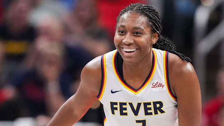 Indiana Fever forward Aliyah Boston (7) smiles after scoring Friday, July 12, 2024, during the game at Gainbridge Fieldhouse in Indianapolis. The Indiana Fever defeated the Phoenix Mercury, 95-86.