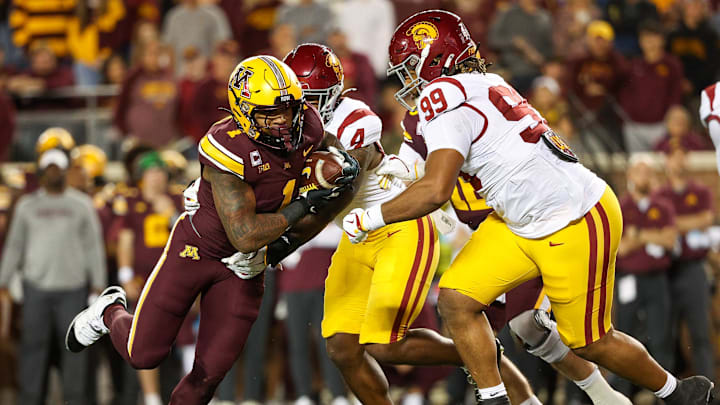 Oct 5, 2024; Minneapolis, Minnesota, USA; Minnesota Golden Gophers running back Darius Taylor (1) runs the ball against the USC Trojans during the first half at Huntington Bank Stadium. Mandatory Credit: Matt Krohn-Imagn Images