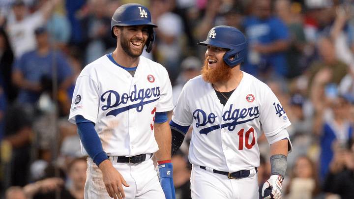 July 4, 2019; Los Angeles, CA, USA; Los Angeles Dodgers shortstop Chris Taylor (3) is greeted by third baseman Justin Turner (10) after scoring a run against the San Diego Padres during the fifth inning at Dodger Stadium. Mandatory Credit: Gary A. Vasquez-Imagn Images July 4, 2019; Los Angeles, CA, USA; Los Angeles Dodgers shortstop Chris Taylor (3) is greeted by third baseman Justin Turner (10) after scoring a run against the San Diego Padres during the fifth inning at Dodger Stadium. Mandatory Credit: Gary A. Vasquez-Imagn Images