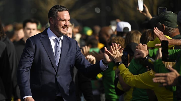 Oct 26, 2024; Eugene, Oregon, USA; Oregon Ducks head coach Dan Lanning greets fans before a game against the Illinois Fighting Illini at Autzen Stadium.