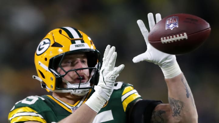 Nov 28, 2024; Green Bay, Wisconsin, USA; Green Bay Packers tight end Tucker Kraft (85) makes a catch against the Miami Dolphins  at Lambeau Field. Mandatory Credit: Wm. Glasheen-Imagn Images