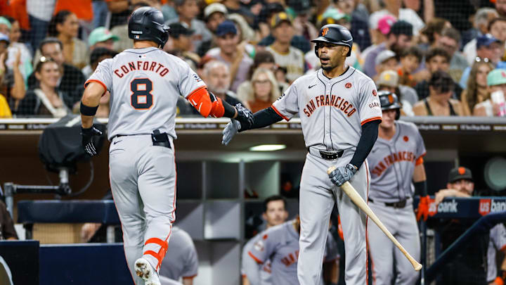 Sep 6, 2024; San Diego, California, USA; San Francisco Giants designated hitter Michael Conforto (8) celebrates with San Francisco Giants first baseman LaMonte Wade Jr. (31) after hitting a one run home run during the sixth inning against the San Diego Padres at Petco Park. Sep 6, 2024; San Diego, California, USA; San Francisco Giants designated hitter Michael Conforto (8) celebrates with San Francisco Giants first baseman LaMonte Wade Jr. (31) after hitting a one run home run during the sixth inning against the San Diego Padres at Petco Park.