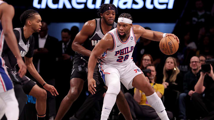 Feb 12, 2025; Brooklyn, New York, USA; Philadelphia 76ers forward Guerschon Yabusele (28) controls the ball against Brooklyn Nets center Day'Ron Sharpe (20) and forward Ziaire Williams (8) during the second quarter at Barclays Center. Mandatory Credit: Brad Penner-Imagn Images Feb 12, 2025; Brooklyn, New York, USA; Philadelphia 76ers forward Guerschon Yabusele (28) controls the ball against Brooklyn Nets center Day'Ron Sharpe (20) and forward Ziaire Williams (8) during the second quarter at Barclays Center. Mandatory Credit: Brad Penner-Imagn Images