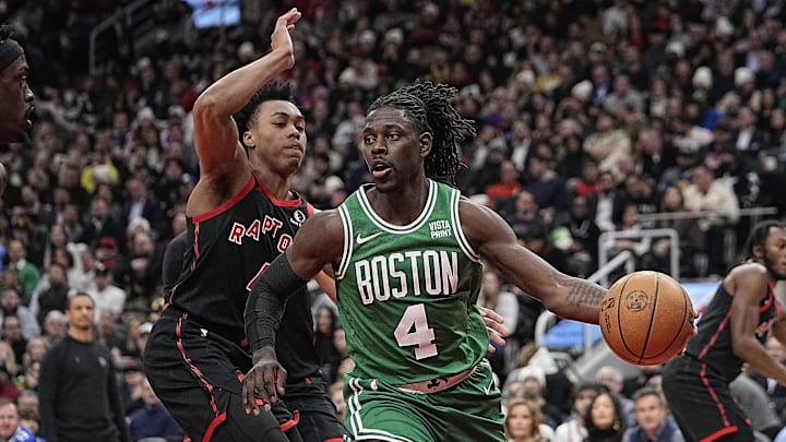 Jan 15, 2024; Toronto, Ontario, CAN; Boston Celtics guard Jrue Holiday (4) drives around Toronto Raptors forward Scottie Barnes (4) during the first half at Scotiabank Arena. Mandatory Credit: John E. Sokolowski-Imagn Images Jan 15, 2024; Toronto, Ontario, CAN; Boston Celtics guard Jrue Holiday (4) drives around Toronto Raptors forward Scottie Barnes (4) during the first half at Scotiabank Arena. Mandatory Credit: John E. Sokolowski-Imagn Images