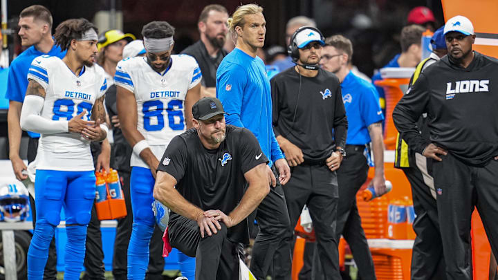 Aug 8, 2025; Atlanta, Georgia, USA; Detroit Lions head coach Dan Campbell reacts on the field after an injury to safety Morice Norris (26) (not shown) during the game against the Atlanta Falcons at Mercedes-Benz Stadium. Mandatory Credit: Dale Zanine-Imagn Images