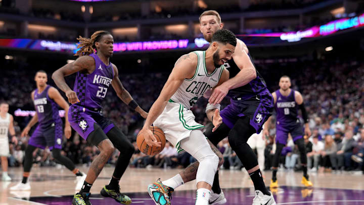 Mar 24, 2025; Sacramento, California, USA; Boston Celtics forward Jayson Tatum (0) loses control of the ball next to Sacramento Kings center Domantas Sabonis (11) in the second quarter at the Golden 1 Center. Mandatory Credit: Cary Edmondson-Imagn Images Mar 24, 2025; Sacramento, California, USA; Boston Celtics forward Jayson Tatum (0) loses control of the ball next to Sacramento Kings center Domantas Sabonis (11) in the second quarter at the Golden 1 Center. Mandatory Credit: Cary Edmondson-Imagn Images