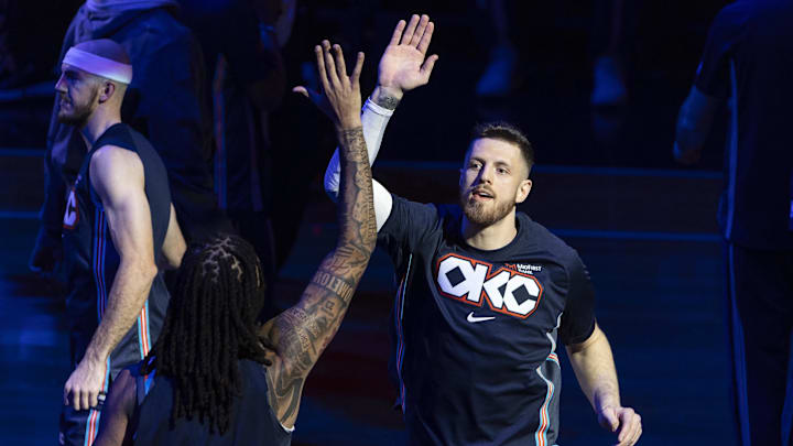 Nov 19, 2025; Oklahoma City, Oklahoma, USA; Oklahoma City Thunder center Isaiah Hartenstein (55) high fives his team during introductions before the start of a game against Sacramento Kings during the first quarter at Paycom Center. Mandatory Credit: Alonzo Adams-Imagn Images