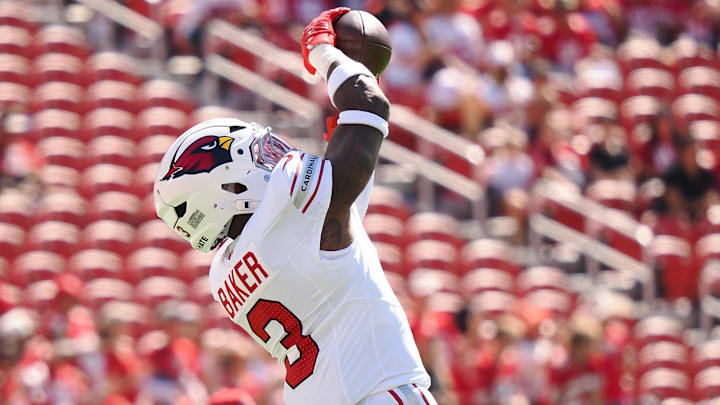 Oct 6, 2024; Santa Clara, California, USA; Arizona Cardinals safety Budda Baker (3) catches the ball during warm ups before the game against the San Francisco 49ers at Levi's Stadium. Mandatory Credit: Kelley L Cox-Imagn Images