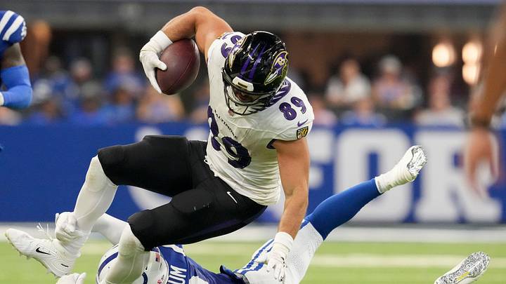 Baltimore Ravens tight end Mark Andrews (89) is tripped up by Indianapolis Colts safety Cam Bynum (0) on Sunday, Sept. 13, 2026, during a game against the Baltimore Ravens at Lucas Oil Stadium in Indianapolis.