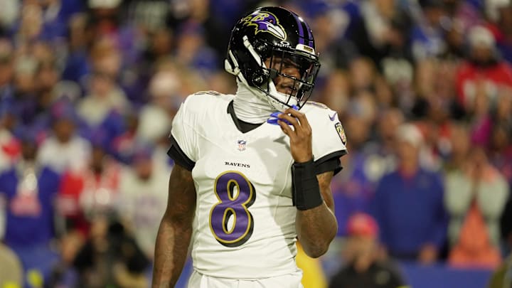Baltimore Ravens quarterback Lamar Jackson looks down field before everyone lines up during first half action against the Baltimore Ravens at Highmark Stadium in Orchard Park on Sept. 7, 2025.