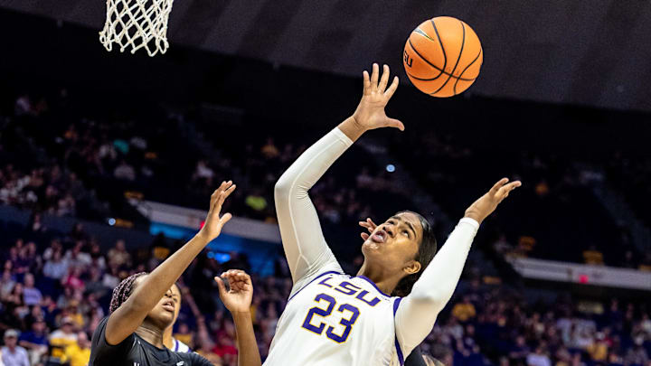 LSU Lady Tigers center Aalyah Del Rosario (23) and Northwestern State Lady Demons forward Clarence Djuela (15) fight for a rebound during the first half at Pete Maravich Assembly Center.