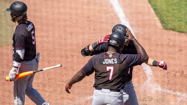 South Carolina baseball catcher/DH Dalton Reeves celebrated a home run with outfielder Kennedy Jones during the Gamecocks' series win over the Florida Gators.