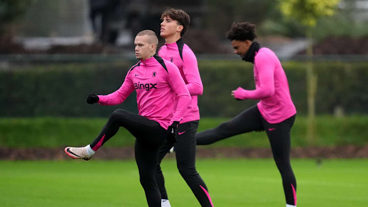 Mudryk (left) training with Casadei (centre) and Veiga (right) ahead of the European clash.