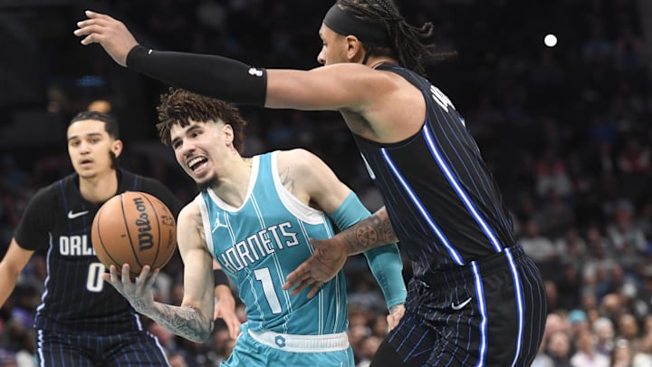 Mar 25, 2025; Charlotte, North Carolina, USA;  Charlotte Hornets guard LaMelo Ball (1) drives in during the second half against the Orlando Magic at the Spectrum Center. Mandatory Credit: Sam Sharpe-Imagn Images