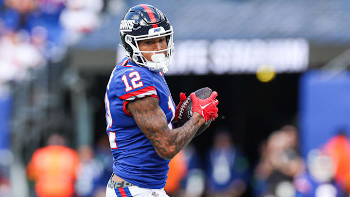 Oct 22, 2023; East Rutherford, New Jersey, USA; New York Giants tight end Darren Waller (12) catches the ball during the first half Washington Commanders at MetLife Stadium. Mandatory Credit: Vincent Carchietta-Imagn Images