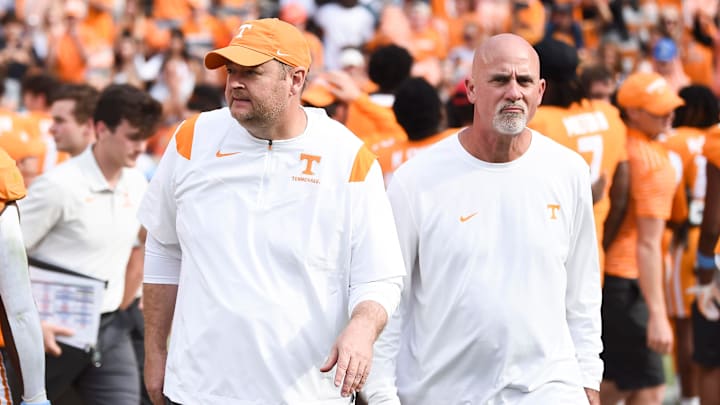 Tennessee football coach Josh Heupel, left, and secondary coach Willie Martinez walk off the field after the win over UT Martin in the NCAA college football game on Saturday, October 22, 2022 in Knoxville, Tenn.