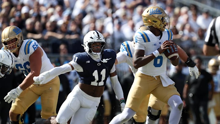 Oct 5, 2024; University Park, Pennsylvania, USA; Penn State Nittany Lions defensive end Abdul Carter (11) pressures UCLA Bruins quarterback Jaylin Davies (6) during the third quarter at Beaver Stadium. Mandatory Credit: Matthew O'Haren-Imagn Images Oct 5, 2024; University Park, Pennsylvania, USA; Penn State Nittany Lions defensive end Abdul Carter (11) pressures UCLA Bruins quarterback Jaylin Davies (6) during the third quarter at Beaver Stadium. Mandatory Credit: Matthew O'Haren-Imagn Images