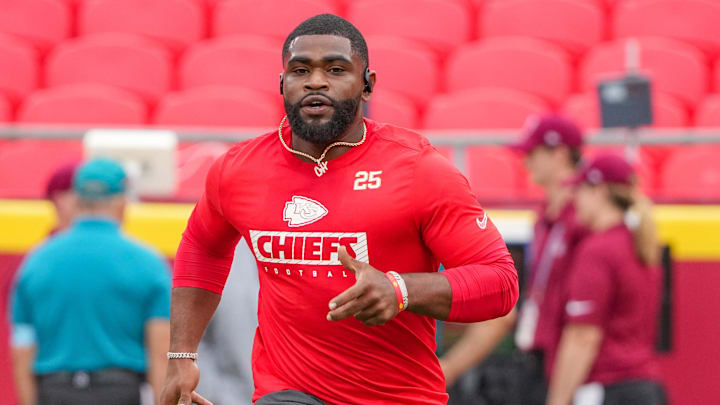Kansas City Chiefs running back Clyde Edwards-Helaire warms up on the field.