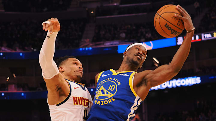 Mar 17, 2025; San Francisco, California, USA; Golden State Warriors forward Jimmy Butler III (10) controls the ball against Denver Nuggets guard Russell Westbrook (4) during the second quarter at Chase Center. Mandatory Credit: Kelley L Cox-Imagn Images Mar 17, 2025; San Francisco, California, USA; Golden State Warriors forward Jimmy Butler III (10) controls the ball against Denver Nuggets guard Russell Westbrook (4) during the second quarter at Chase Center. Mandatory Credit: Kelley L Cox-Imagn Images
