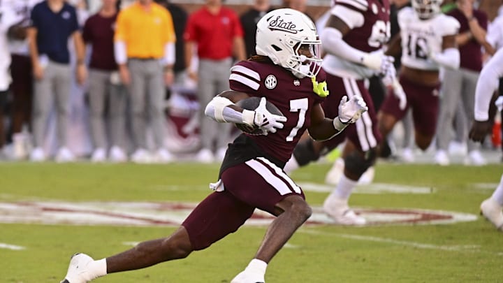Oct 19, 2024; Starkville, Mississippi, USA; Mississippi State Bulldogs wide receiver Mario Craver (7) runs the ball against the Texas A&M Aggies before suffering an apparent injury on the play during the third quarter at Davis Wade Stadium at Scott Field. Mandatory Credit: Matt Bush-Imagn Images