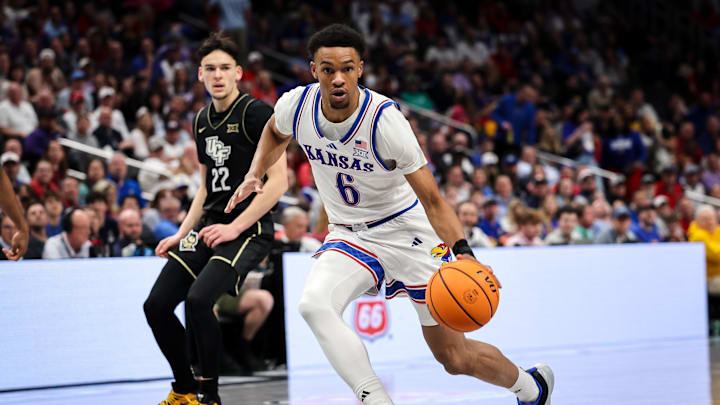 Mar 12, 2025; Kansas City, MO, USA; Kansas Jayhawks guard Rylan Griffen (6) drives to the basket during the first half against the UCF Knights at T-Mobile Center. Mandatory Credit: William Purnell-Imagn Images Mar 12, 2025; Kansas City, MO, USA; Kansas Jayhawks guard Rylan Griffen (6) drives to the basket during the first half against the UCF Knights at T-Mobile Center. Mandatory Credit: William Purnell-Imagn Images