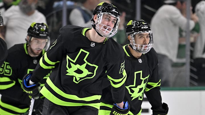 Feb 2, 2025; Dallas, Texas, USA; Dallas Stars left wing Mason Marchment (27) and defenseman Matt Dumba (3) skate off the icc after Marchment scores a goal against the Columbus Blue Jackets during the first period at the American Airlines Center. Mandatory Credit: Jerome Miron-Imagn Images