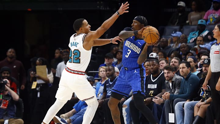 Oct 26, 2024; Memphis, Tennessee, USA; Orlando Magic guard Kentavious Caldwell-Pope (3) looks to pass the ball as Memphis Grizzlies guard Desmond Bane (22) defends during the second half at FedExForum. Mandatory Credit: Petre Thomas-Imagn Images