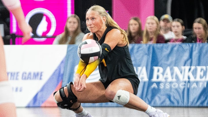 Hinton's Bailey Boeve (9) hits the ball after a Denver serve on Nov. 6, 2025, at Stream Arena in Coralville, Iowa.