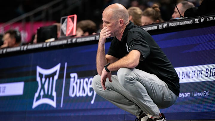 Mar 11, 2026; Kansas City, MO, USA; Oklahoma State Cowboys coach Steve Lutz reacts to game play during the second half against the TCU Horned Frogs at T-Mobile Center. Mandatory Credit: William Purnell-Imagn Images Mar 11, 2026; Kansas City, MO, USA; Oklahoma State Cowboys coach Steve Lutz reacts to game play during the second half against the TCU Horned Frogs at T-Mobile Center. Mandatory Credit: William Purnell-Imagn Images
