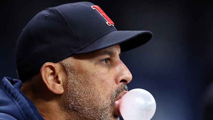 Sep 19, 2024; St. Petersburg, Florida, USA; Boston Red Sox manager Alex Cora (13) looks on from the dugout against the Tampa Bay Rays in the fourth inning at Tropicana Field. Sep 19, 2024; St. Petersburg, Florida, USA; Boston Red Sox manager Alex Cora (13) looks on from the dugout against the Tampa Bay Rays in the fourth inning at Tropicana Field.