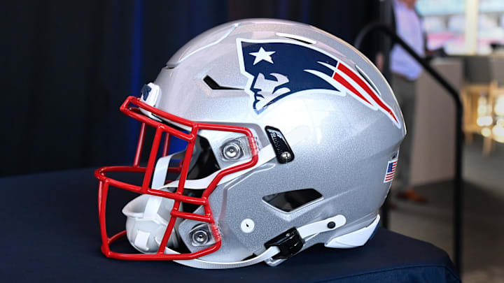 Jan 17, 2024; Foxborough, MA, USA; A New England Patriots helmet sits on a table prior to a press conference at Gillette Stadium. Mandatory Credit: Eric Canha-Imagn Images Jan 17, 2024; Foxborough, MA, USA; A New England Patriots helmet sits on a table prior to a press conference at Gillette Stadium. Mandatory Credit: Eric Canha-Imagn Images