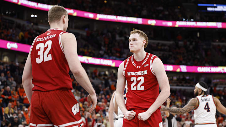 Mar 13, 2026; Chicago, IL, USA; Wisconsin Badgers forward Austin Rapp (22) reacts during overtime at United Center. Mandatory Credit: Kamil Krzaczynski-Imagn Images