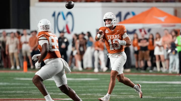 Sep 20, 2025; Austin, Texas, USA; Texas Longhorns quarterback Matthew Caldwell (18) throws a pass during the second half against the Sam Houston Bearkats at Darrell K Royal-Texas Memorial Stadium. Mandatory Credit: Scott Wachter-Imagn Images Sep 20, 2025; Austin, Texas, USA; Texas Longhorns quarterback Matthew Caldwell (18) throws a pass during the second half against the Sam Houston Bearkats at Darrell K Royal-Texas Memorial Stadium. Mandatory Credit: Scott Wachter-Imagn Images