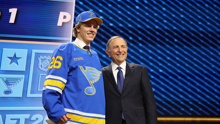 Jun 26, 2026; Buffalo, New York, USA; Tynan Lawrence poses beside NHL commissioner Gary Bettman after being selected with the eleventh pick in the first round of the 2026 NHL Draft by the St. Louis Blues at KeyBank Center. Mandatory Credit: Timothy T. Ludwig-Imagn Images Jun 26, 2026; Buffalo, New York, USA; Tynan Lawrence poses beside NHL commissioner Gary Bettman after being selected with the eleventh pick in the first round of the 2026 NHL Draft by the St. Louis Blues at KeyBank Center. Mandatory Credit: Timothy T. Ludwig-Imagn Images