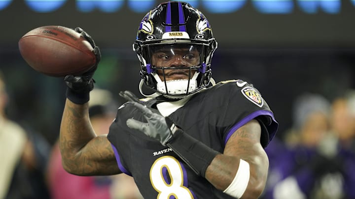 Dec 21, 2025; Baltimore, Maryland, USA; Baltimore Ravens quarterback Lamar Jackson (8) warms up prior to the game against the New England Patriots at M&T Bank Stadium. Mandatory Credit: Mitch Stringer-Imagn Images