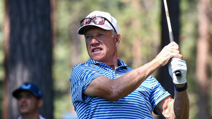 Former NFL football player John Elway hits his tee on the second hole on day one of the 2024 American Century Championship at Edgewood Tahoe Golf Course on July 12, 2024 in Stateline, Nevada. 