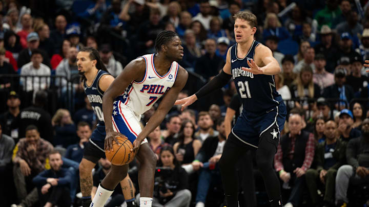 Dec 27, 2023; Orlando, Florida, USA; Philadelphia 76ers center Mo Bamba (7) holds the ball against