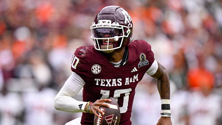 Texas A&M Aggies quarterback Marcel Reed (10) runs with the ball during the game between the Aggies and the Hurricanes at Kyle Field. Texas A&M Aggies quarterback Marcel Reed (10) runs with the ball during the game between the Aggies and the Hurricanes at Kyle Field.