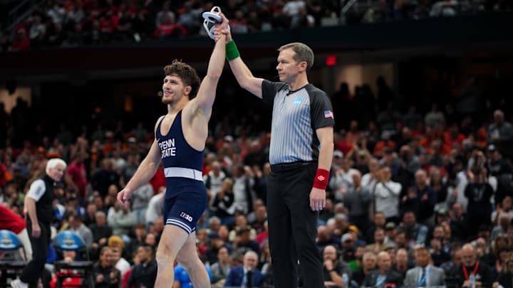 Penn State Nittany Lions wrestler Levi Haines reacts to defeating Nebraska Cornhuskers' Christopher Minto during the NCAA Wrestling Championship at Rocket Arena.