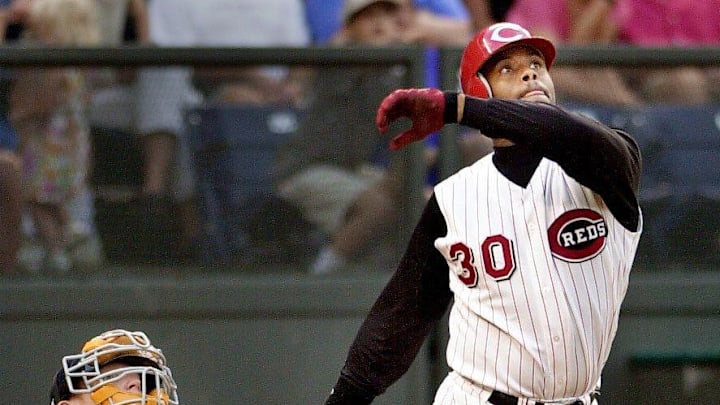 JULY 1, 2001: Ken Griffey, Jr., along with Tigers catcher Robert Fick, watches a huge solo home run fly into the yellow seats in the sixth inning as the Reds ran away with a victory over the Tigers at Cinergy Field.

Title No Title