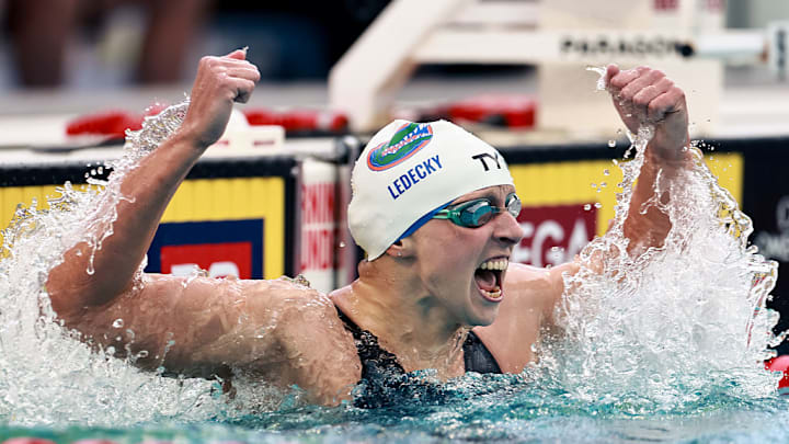 Swimmer Katie Ledecky celebrates after a victory at the Tyr Pro Swim Series in Fort Lauderdale, Fla.