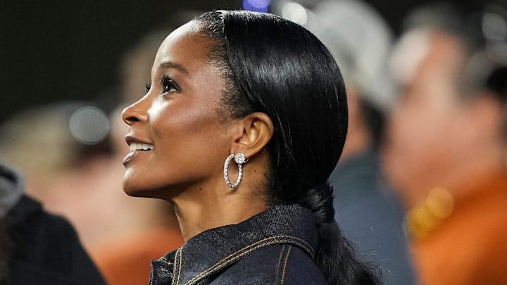Loreal Sarkisian, wife of Texas Longhorns head coach Steve Sarkisian, watches warm-ups before the game against Texas Tech.