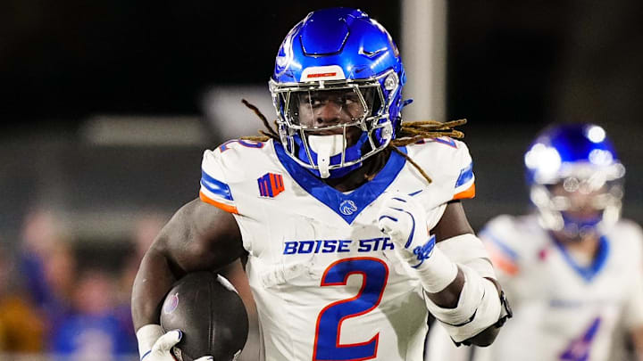 Nov 23, 2024; Laramie, Wyoming, USA; Boise State Broncos running back and Heisman Trophy candidate Ashton Jeanty (2) runs for a touchdown against the Wyoming Cowboys during the first quarter at Jonah Field at War Memorial Stadium. Mandatory Credit: Troy Babbitt-Imagn Images
Nov 23, 2024; Laramie, Wyoming, USA; Boise State Broncos running back and Heisman Trophy candidate Ashton Jeanty (2) runs for a touchdown against the Wyoming Cowboys during the first quarter at Jonah Field at War Memorial Stadium. Mandatory Credit: Troy Babbitt-Imagn Images